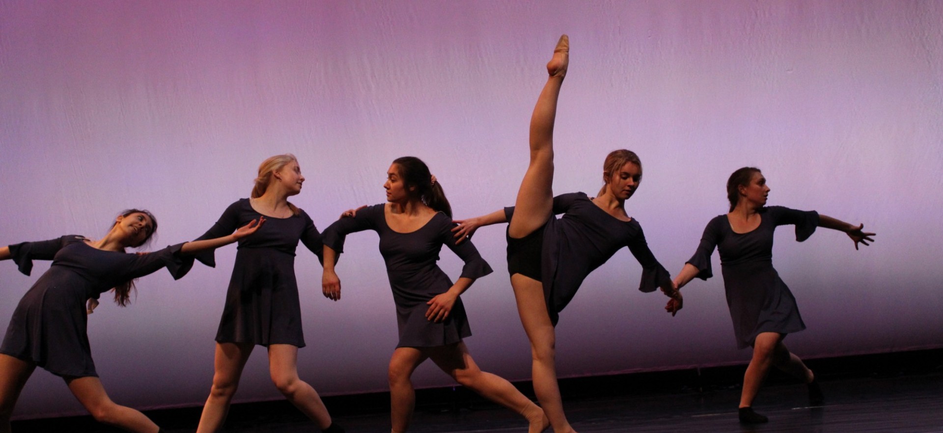 Dancers from our Spring 2019 show performing choreography by Gianna Raimo and Zoe Novello onstage.