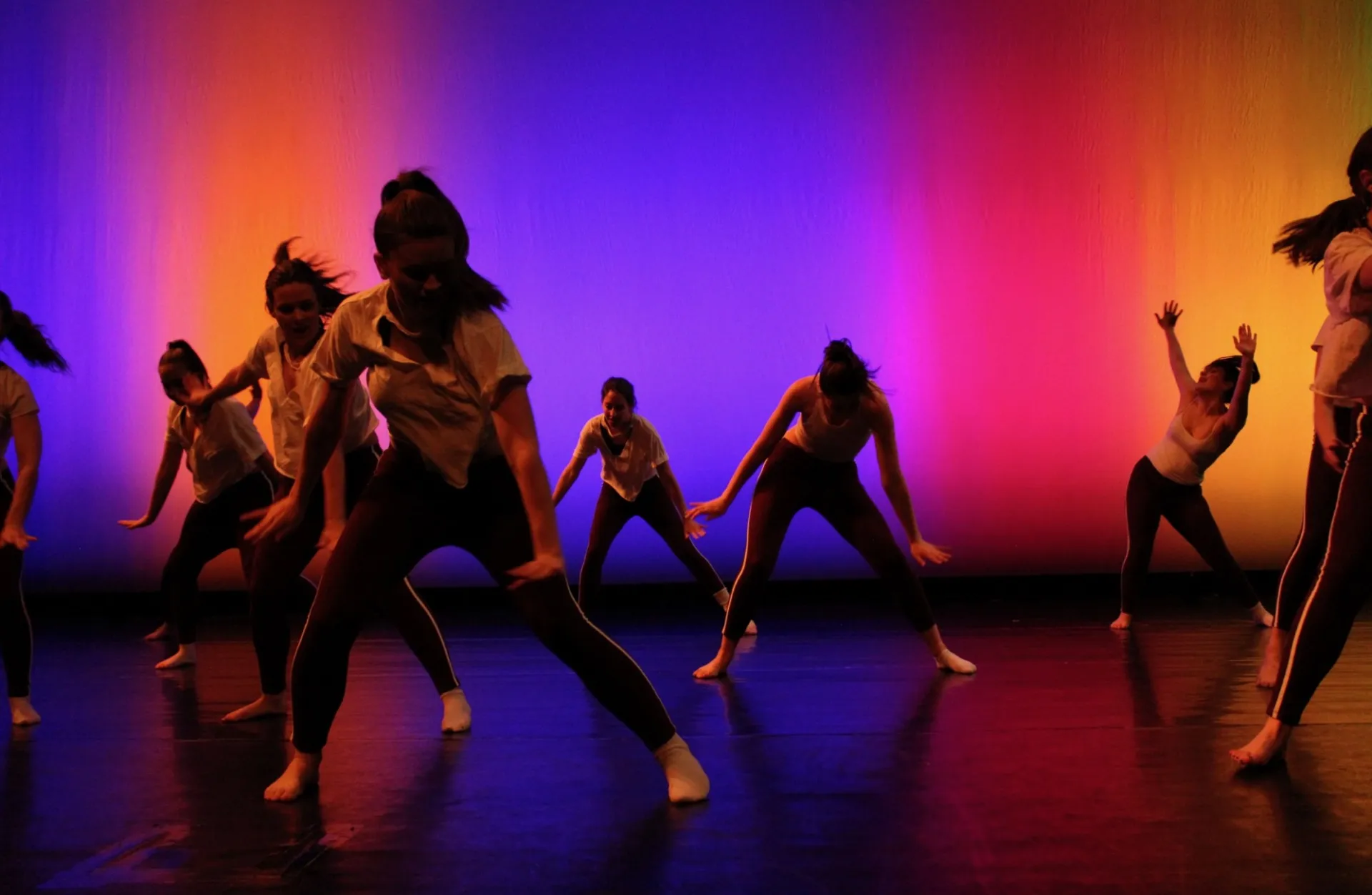Dancers from our Spring 2019 show performing choreography by Chelsea Jean-Michel onstage.
